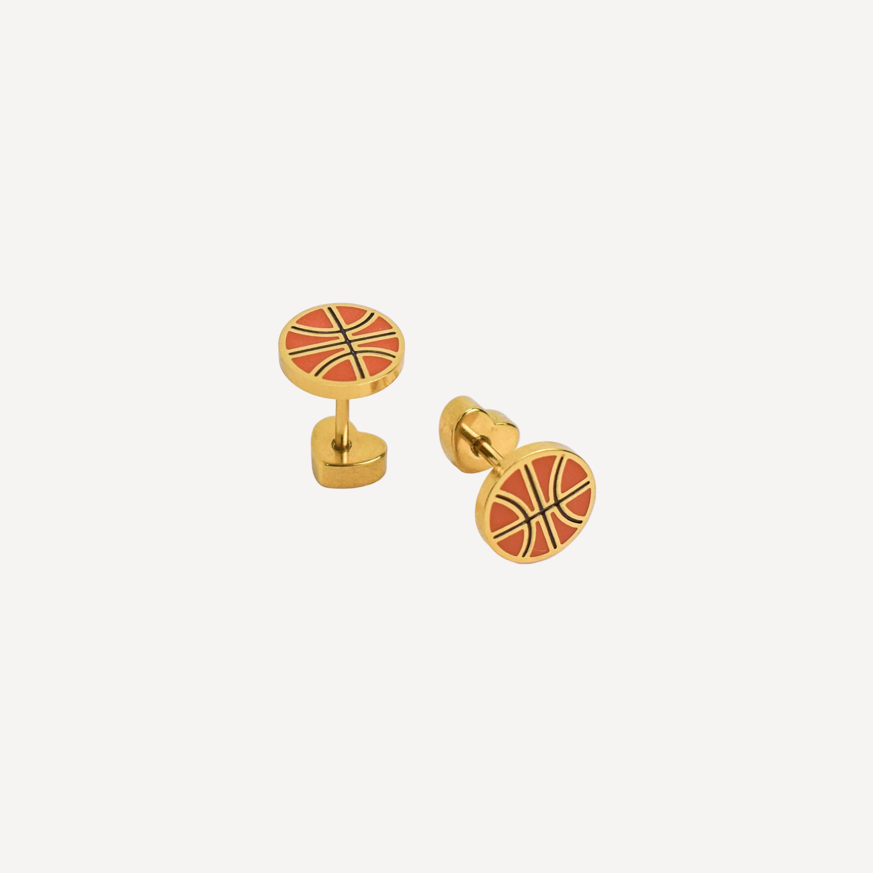 Gold basketball-themed cufflinks on a white background