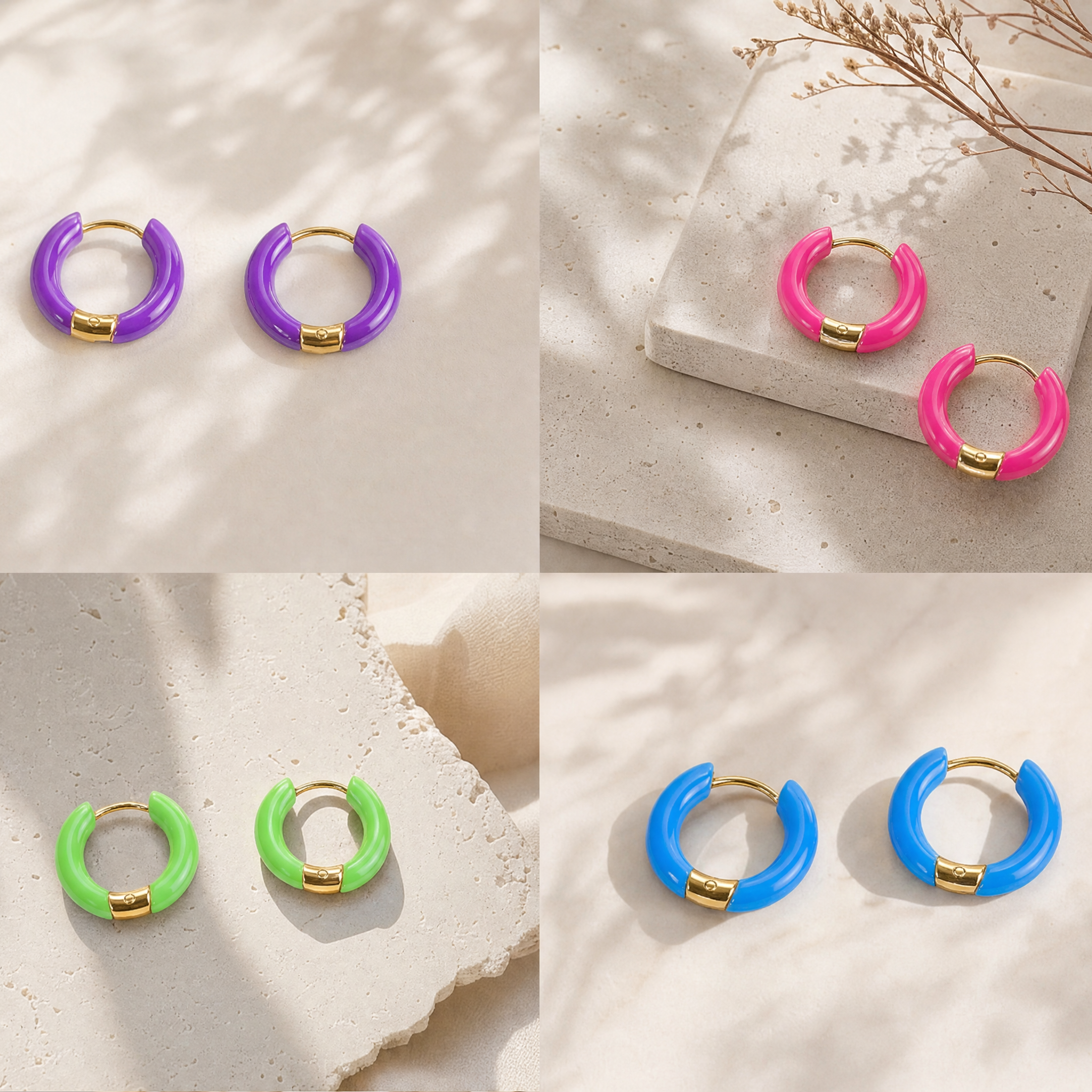 Six pairs of small hoop earrings in different bright colors (purple, pink, green, blue, light blue, and dark pink) with gold-tone metal, displayed on textured stone slabs with soft leaf shadows.