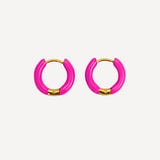 Pair of pink hoop earrings with gold accents on a white background