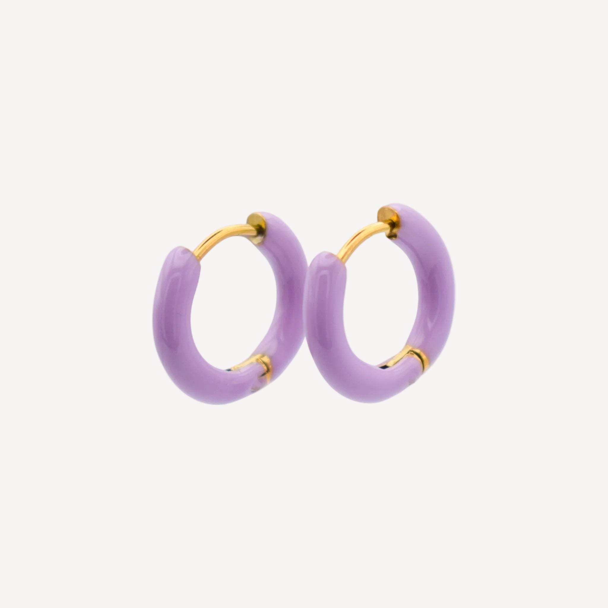 Purple hoop earrings with gold accents on a white background