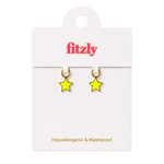 A pair of small yellow star-shaped hoop earrings displayed on a white Fitzly retail card, with the brand name in pink at the top and the text 'Hypoallergenic & Waterproof' near the bottom.