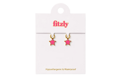 A pair of small pink star-shaped hoop earrings with gold-tone rims, displayed on a white Fitzly retail card against a white background.