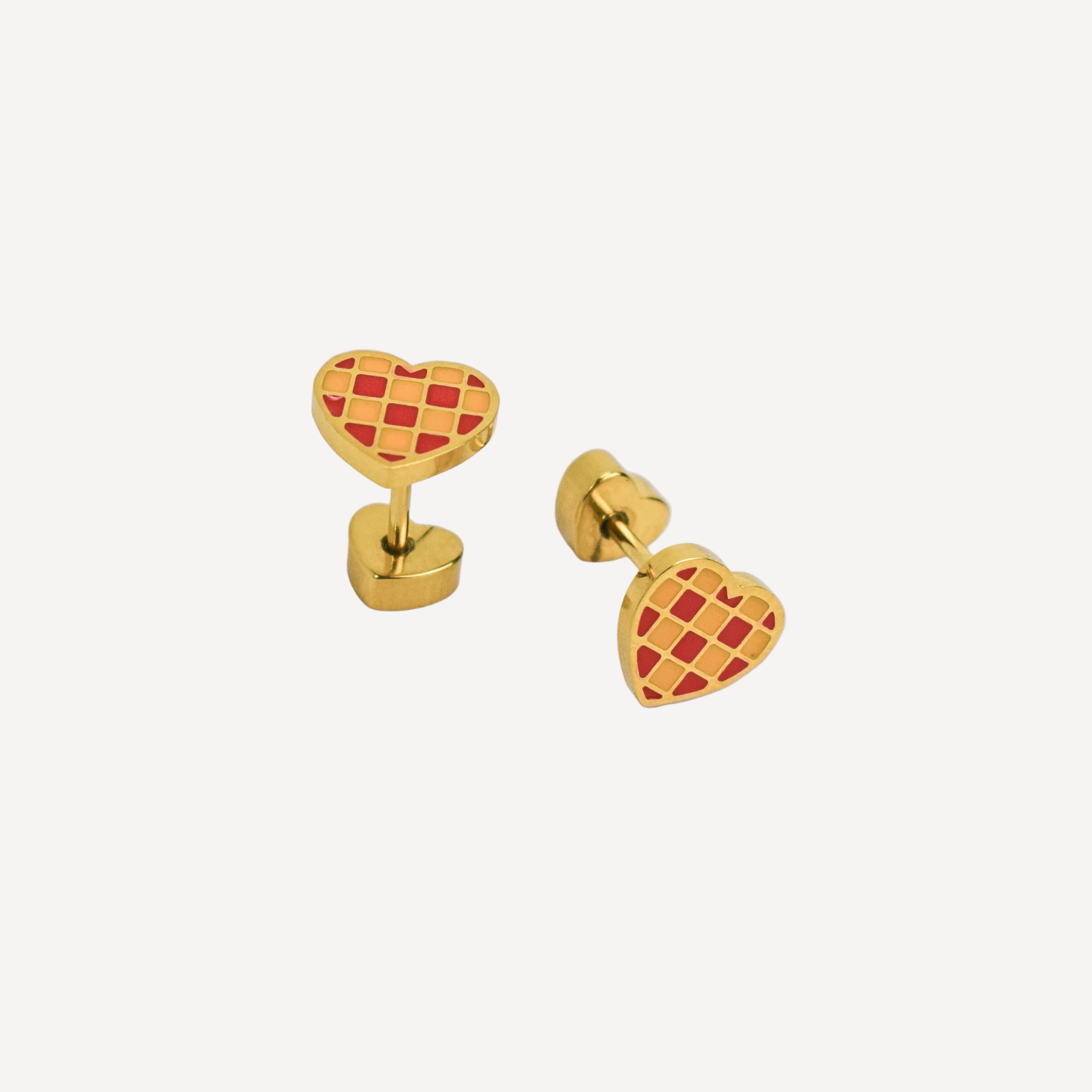 Red and Gold Checkered heart studs on white background